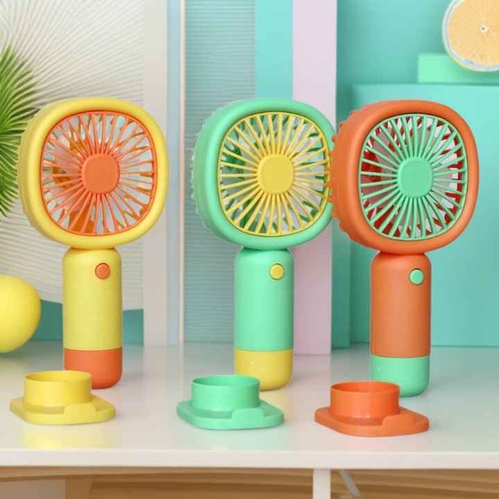 Unisex Håndholdt Vifte med ergonomisk design og praktisk ståfunksjon Luvikno
