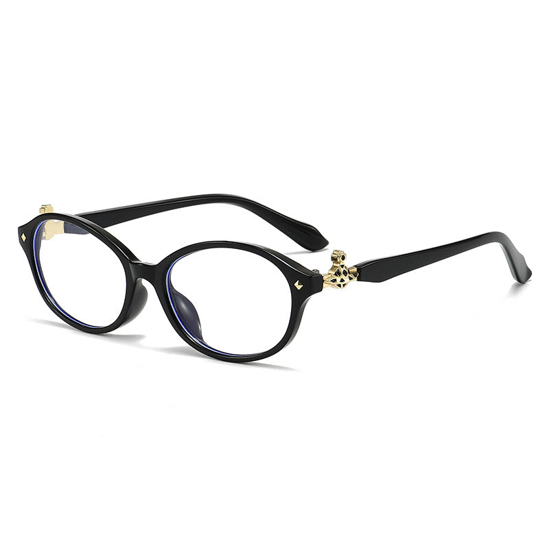 Dame motekunstig brille i elegant ova-design med gyldne aksenter Luvikno