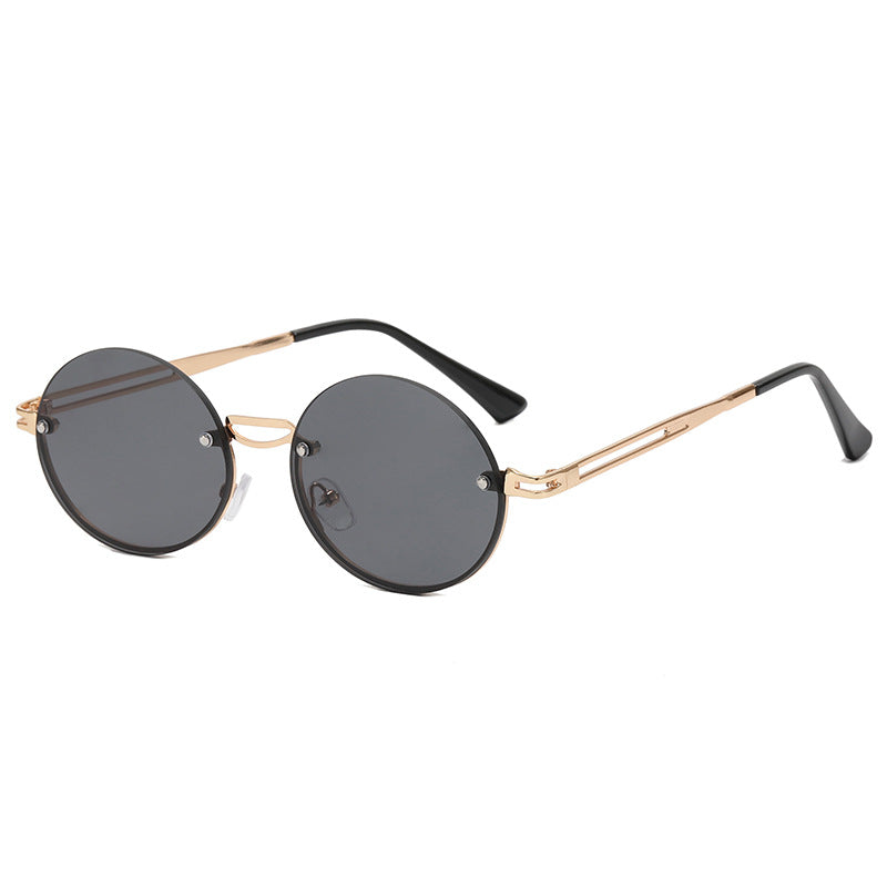 Dame rund solbrille med fin metallramme Luvikno