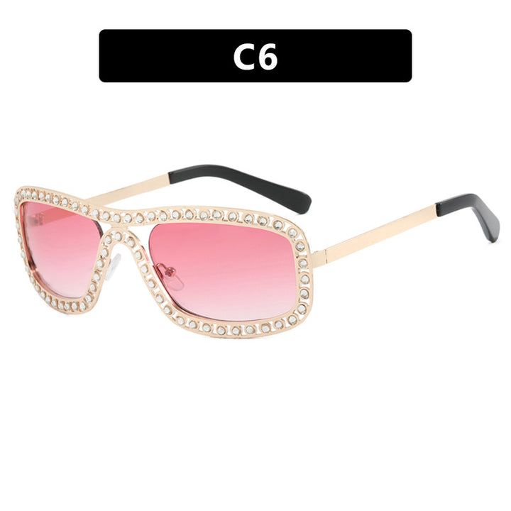 Dame moteriktig solbrille med glitrende ramme Luvikno