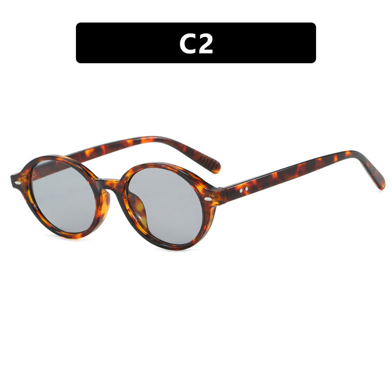 Dame rund solbrille med moderne design og polariserte glass Luvikno