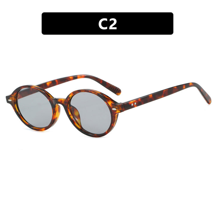 Dame rund solbrille med moderne design og polariserte glass Luvikno