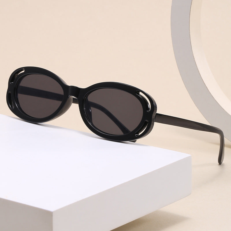 Damen modische solbrille med oval ramme og unikt design Luvikno