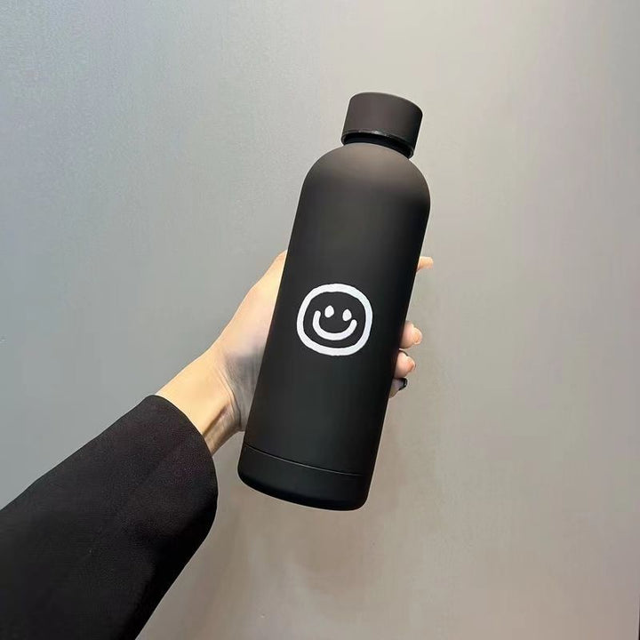 Damen Isoliertrinkflaske med lyst smilmotiv Luvikno