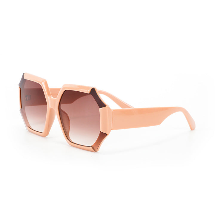 Dame moterelatert solbrille med fasettert ramme Luvikno