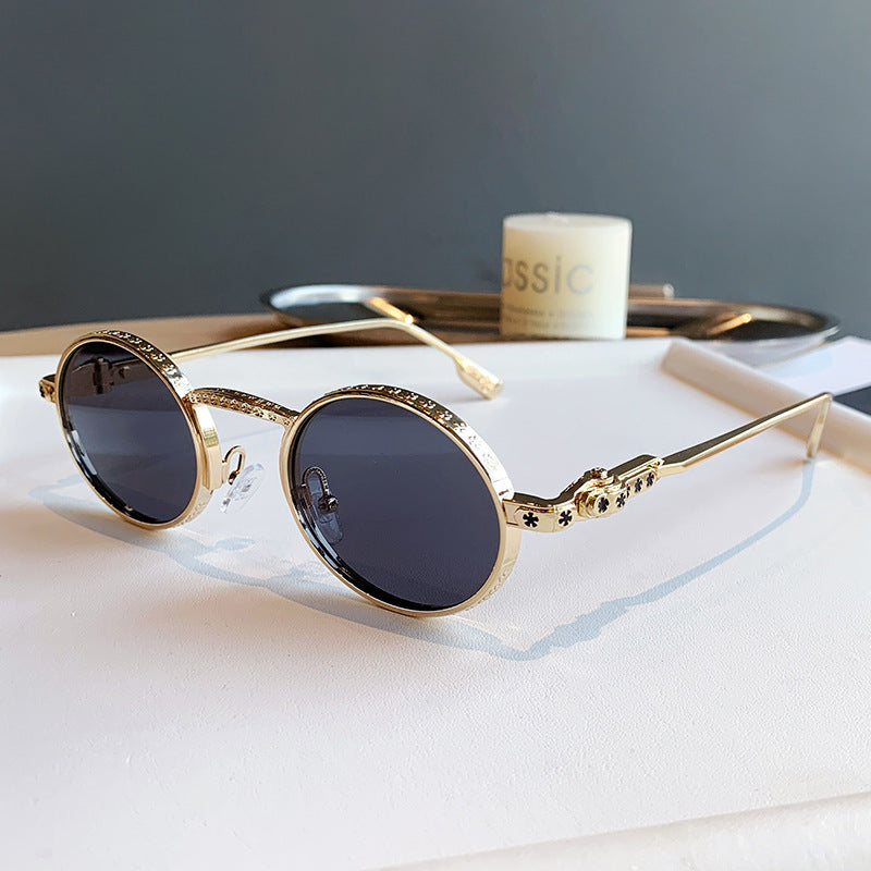 Dame Elegant solbrille med filigran detaljer Luvikno