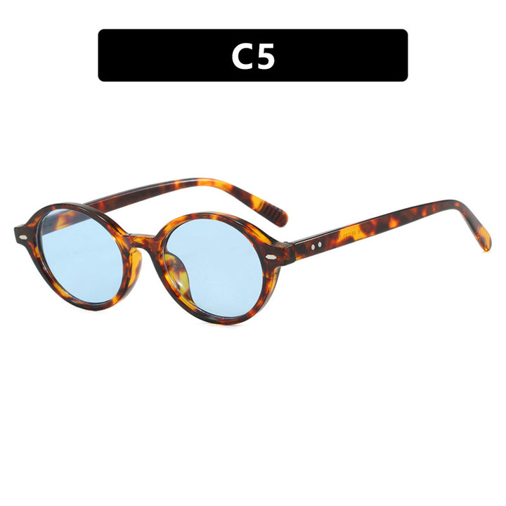 Dame rund solbrille med moderne design og polariserte glass Luvikno