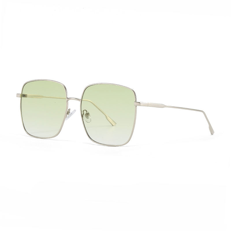 Dame solbrille med moderne firkantet rustfritt stålramme og polarisert glass Luvikno