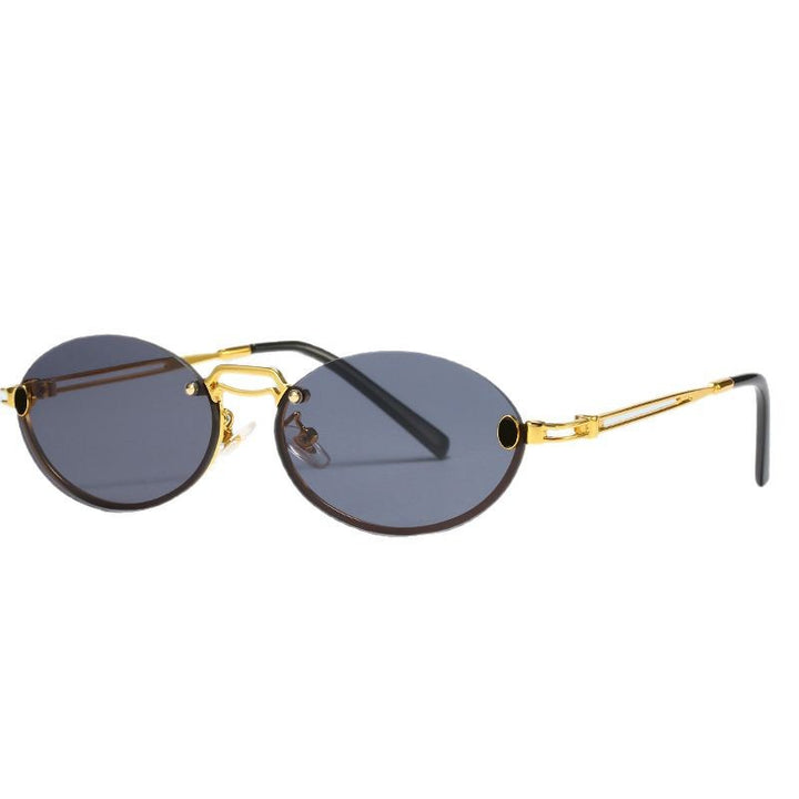 Dame moteriktig solbrille med filigran metallramme og stilleggende design Luvikno