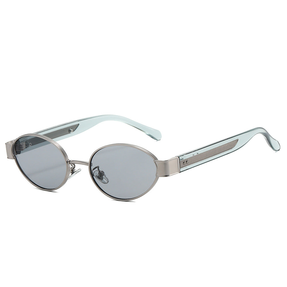 Dame solbrille i moderne, ovale ramme med harmonisk fargekombinasjon Luvikno