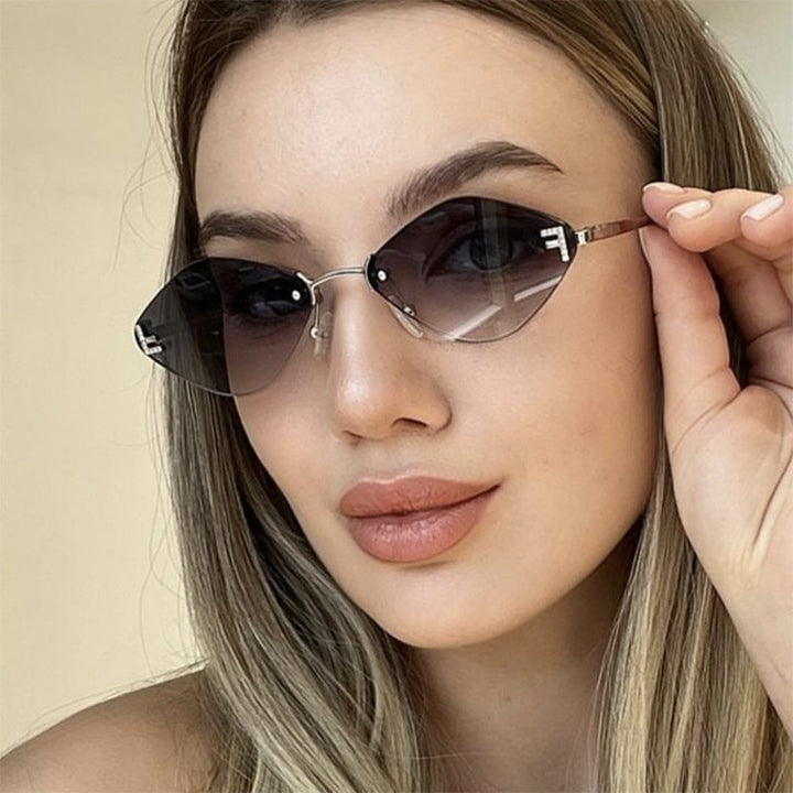 Dame geometrisk solbrille i ekstravagant design med gradiertede glass Luvikno