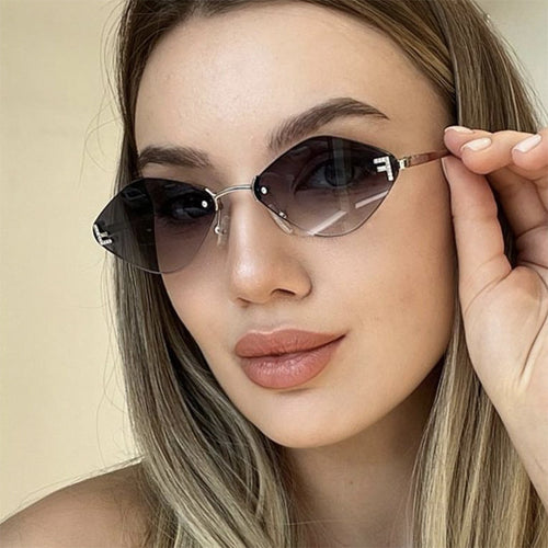 Dame geometrisk solbrille i ekstravagant design med gradiertede glass Luvikno