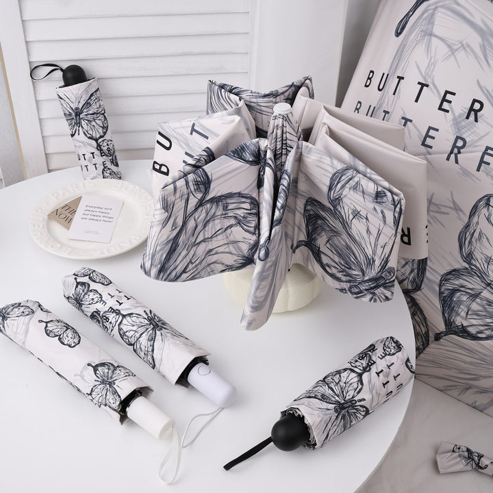 Dame fashionable foldeparaply med leken design Luvikno
