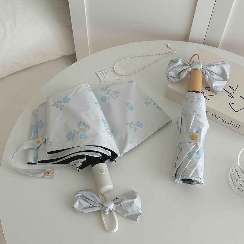 Damer Faltende Paraply med stilfullt blomsterdesign Luvikno