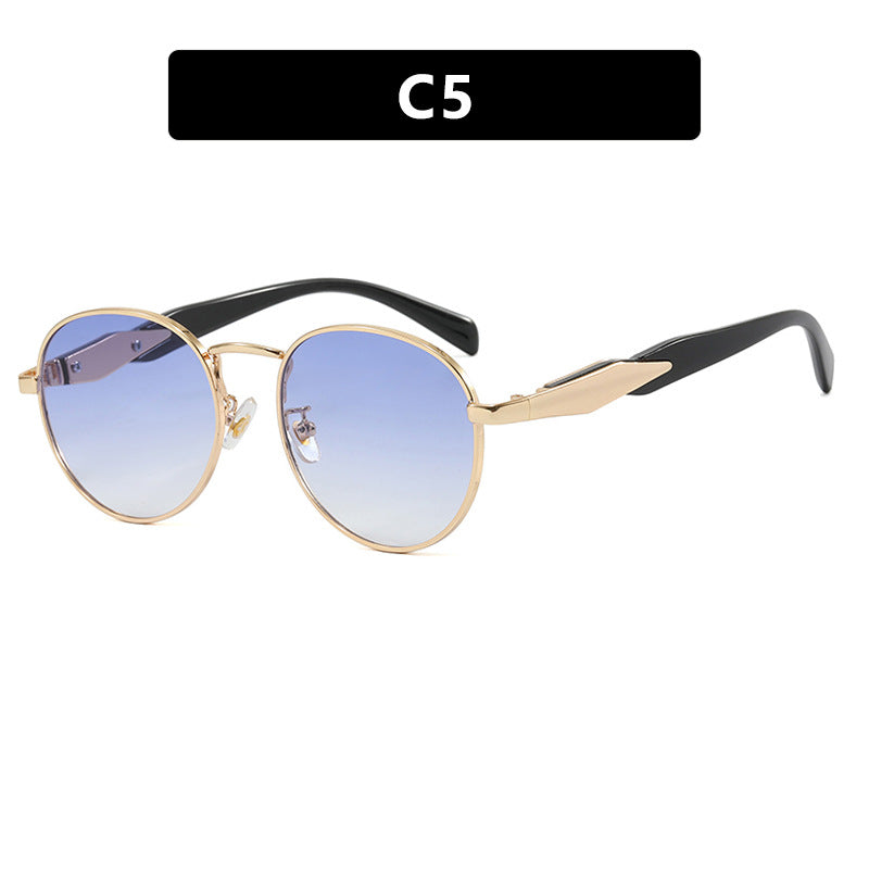 Dame rund solbrille med elegant, gyllen ramme og UV-beskyttelse Luvikno