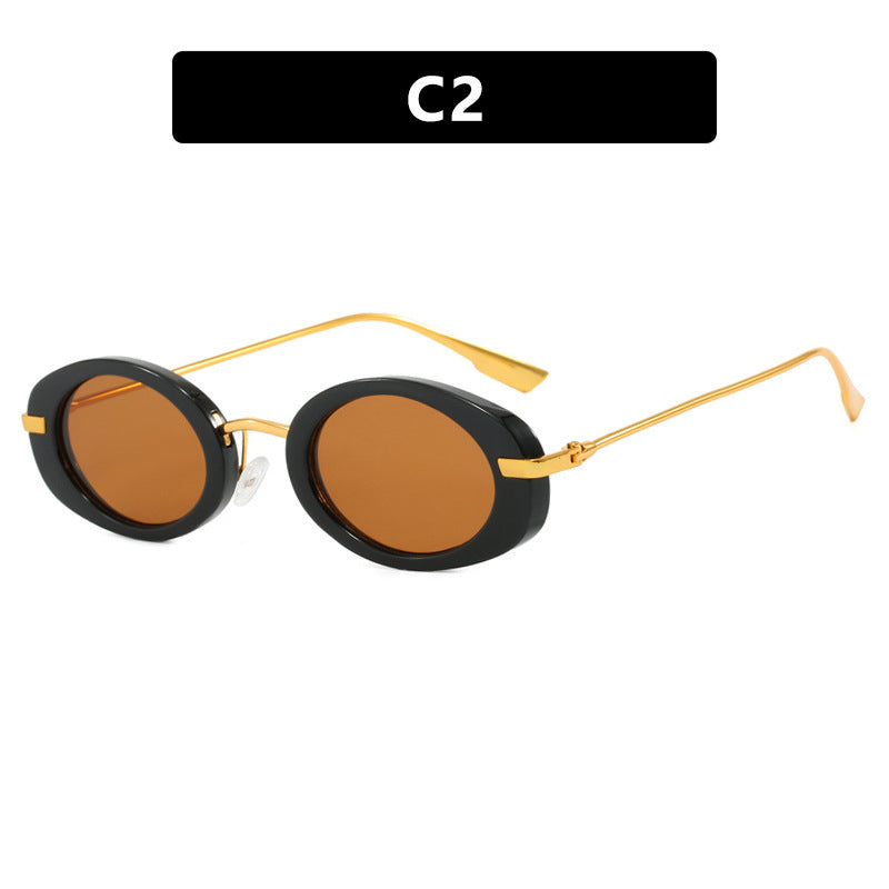 Dame moteriktig solbrille i elegant ovalt design Luvikno