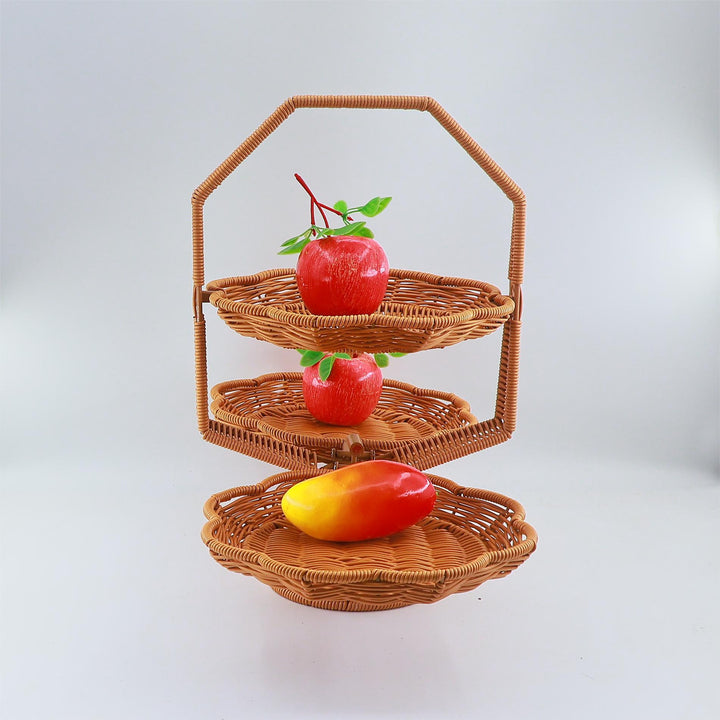 Med en elegant, tretrinns fruktskål Luvikno