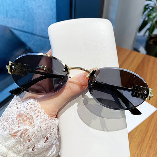 Dame modische solbriller i elegant oval design Luvikno