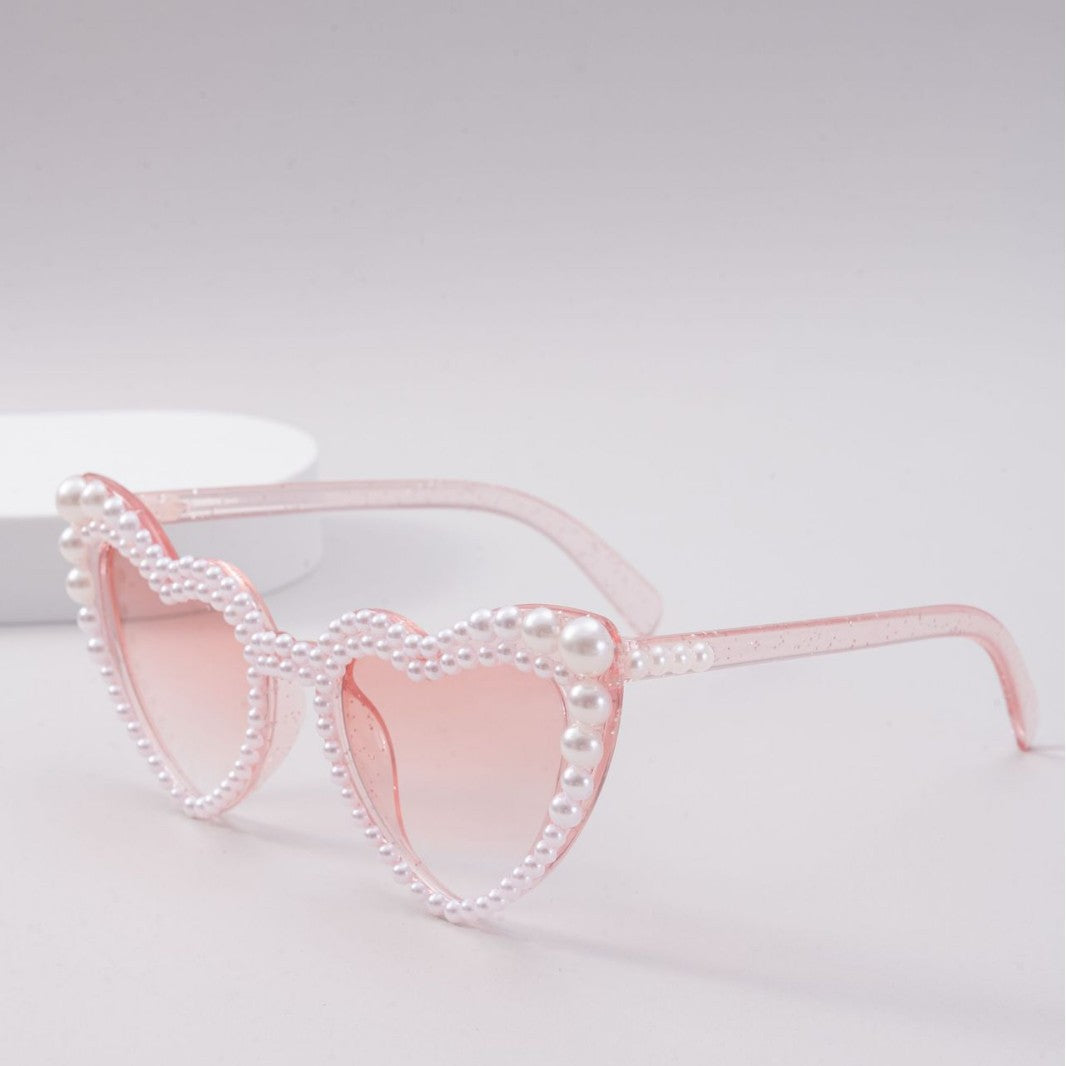 Dame designer solbrille med perleinnramming fra Luvikno