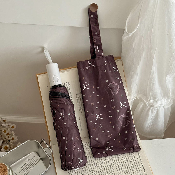 Dame sammenleggbart regnparaply med elegant anhengdesign Luvikno