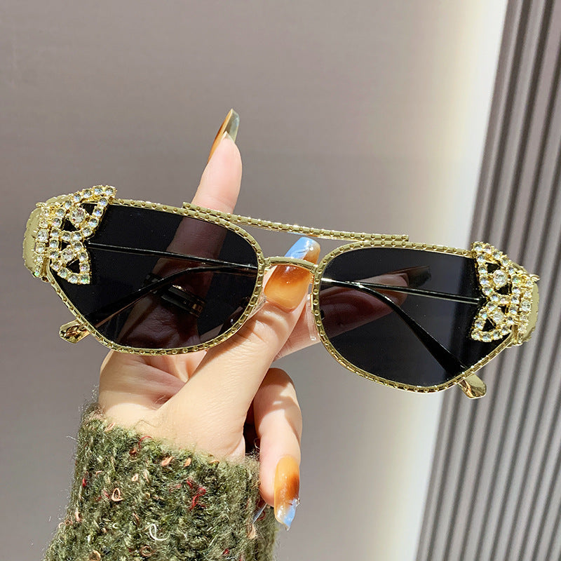 Dame luksus solbrille med elegant sommerfugl-detalj Luvikno