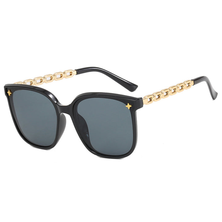 Dame moteriktig solbrille med stilige kjedeakenter Luvikno