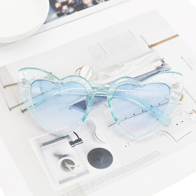 Dame hjerteformet solbrille med glitrende ramme Luvikno