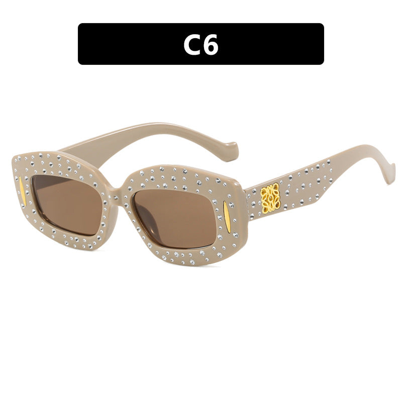 Dame moteriktig solbrille med glamorøs strass-dekor Luvikno