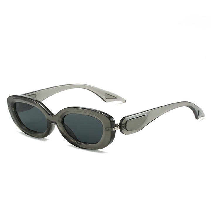 Dame moteriktig solbrille med stilfull, buet ramme Luvikno