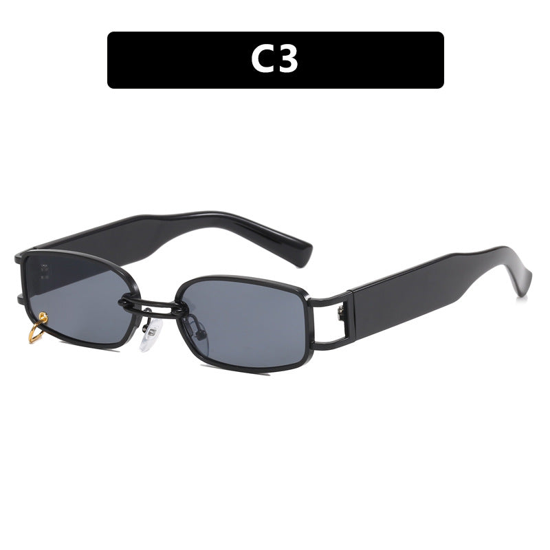 Dame moteriktig solbrille med innovativ rektangulær design og elegante metallakenter Luvikno