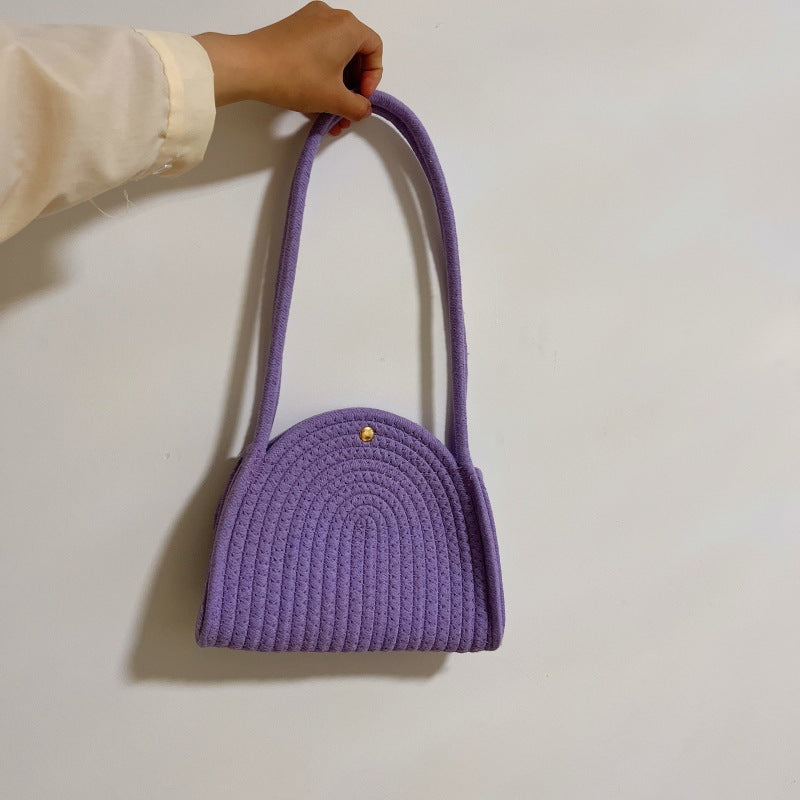 Dame moteriktig skulderveske med ripet design Luvikno