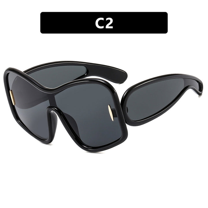 Dame futuristisk solbrille med ekstra bred design og beskyttende UV-filter Luvikno