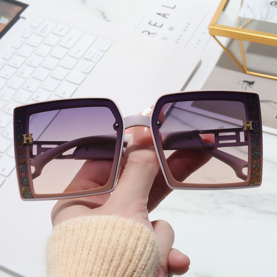 Dame trendy solbrille med ekstravagant, rektangulær ramme Luvikno
