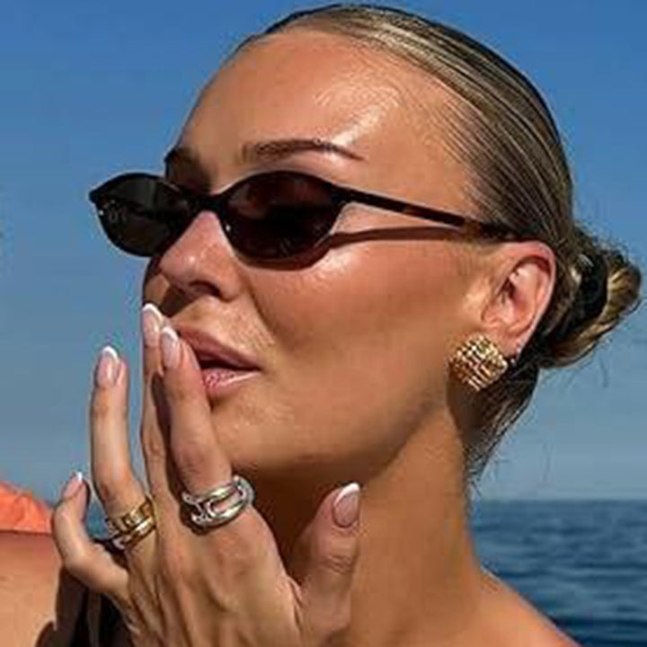 Damer ovalformede solbriller med transparent ramme og UV-beskyttelse Luvikno