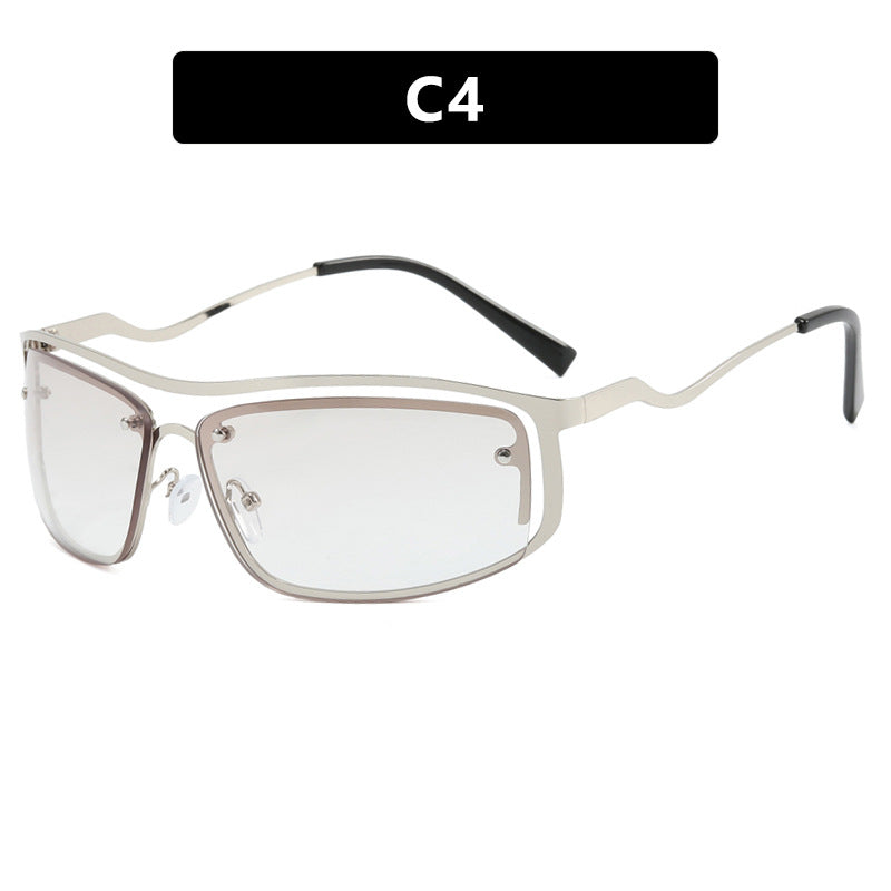 Damer futuristisk solbrille med elegant metallramme og høye transparente glass Luvikno