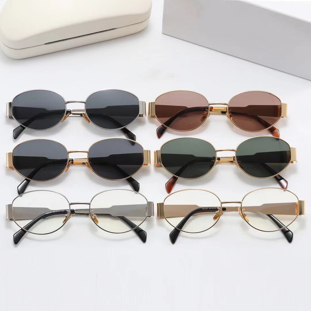 Dame elegant oval solbrille med gullfarget ramme Luvikno