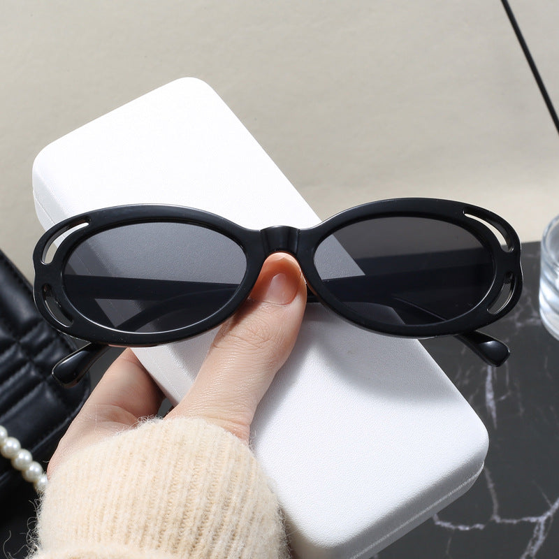 Damen modische solbrille med oval ramme og unikt design Luvikno