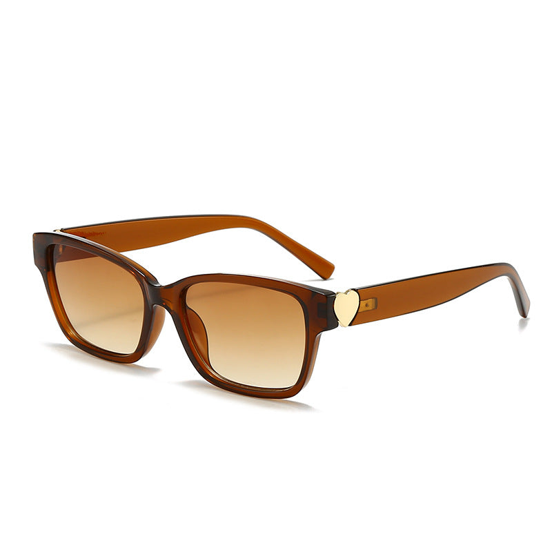 Dame moterik kvadratisk solbrille med hjerte-senter Luvikno