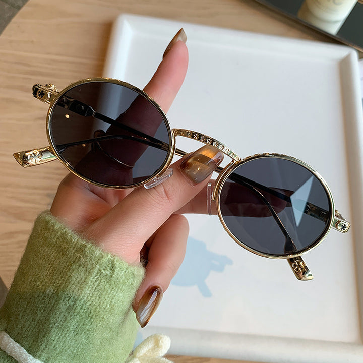 Dame Elegant solbrille med filigran detaljer Luvikno