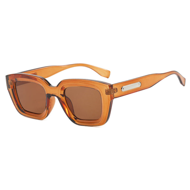 Dame kvadratisk solbrille med gjennomsiktig ramme og brune glass Luvikno