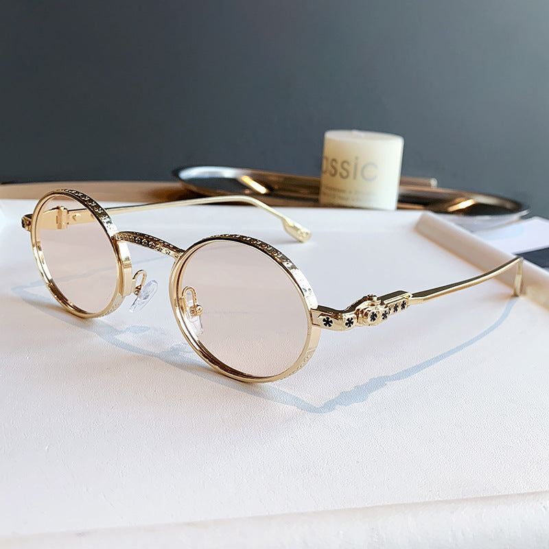 Dame Elegant solbrille med filigran detaljer Luvikno