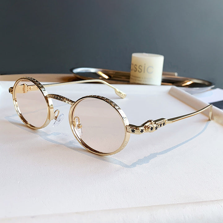 Dame Elegant solbrille med filigran detaljer Luvikno