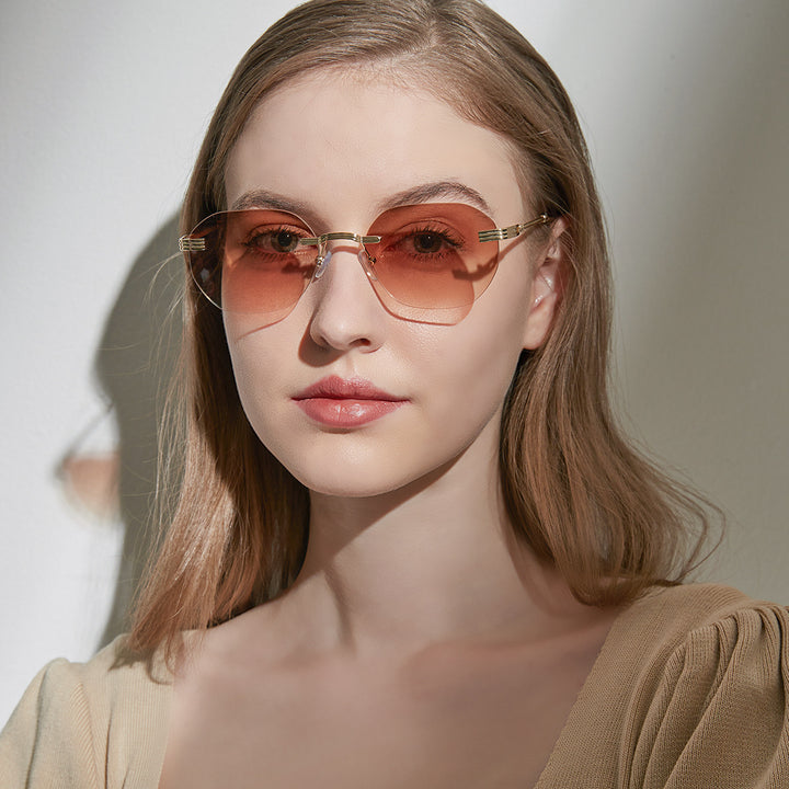 Dame geometrisk solbrille med elegant metallramme Luvikno