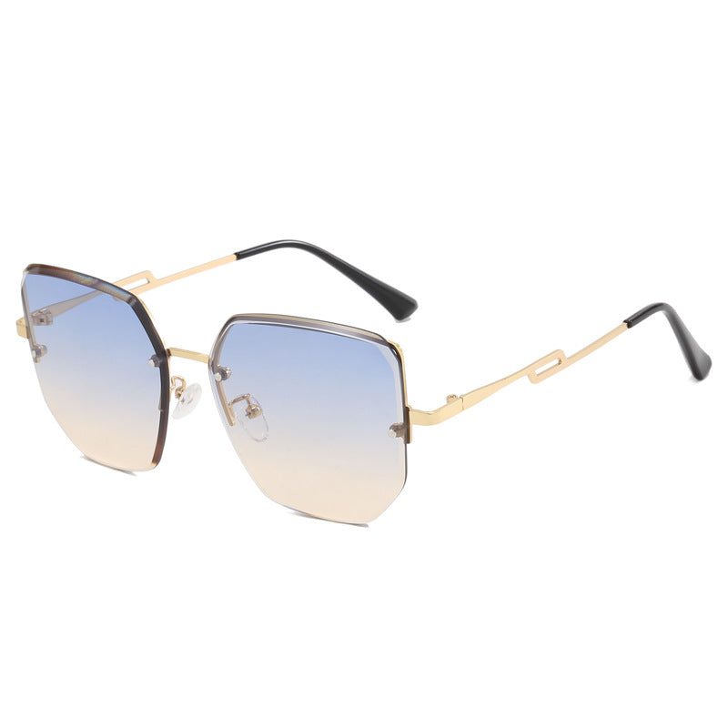 Dame geometrisk designer-solbrille med speilende linser Luvikno