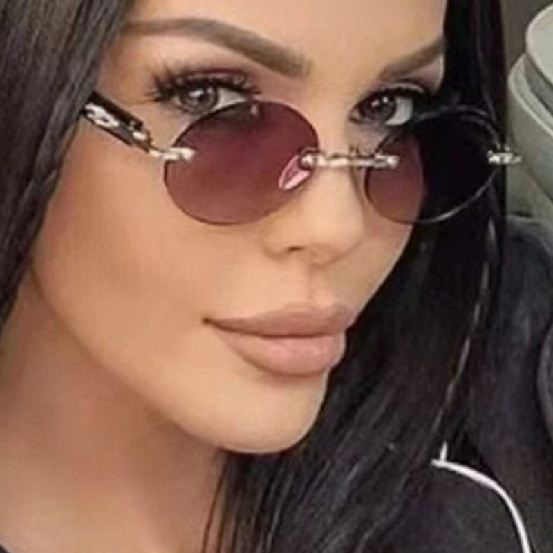 Dame rund solbrille med elegant treinnramme og UV-beskyttelse Luvikno