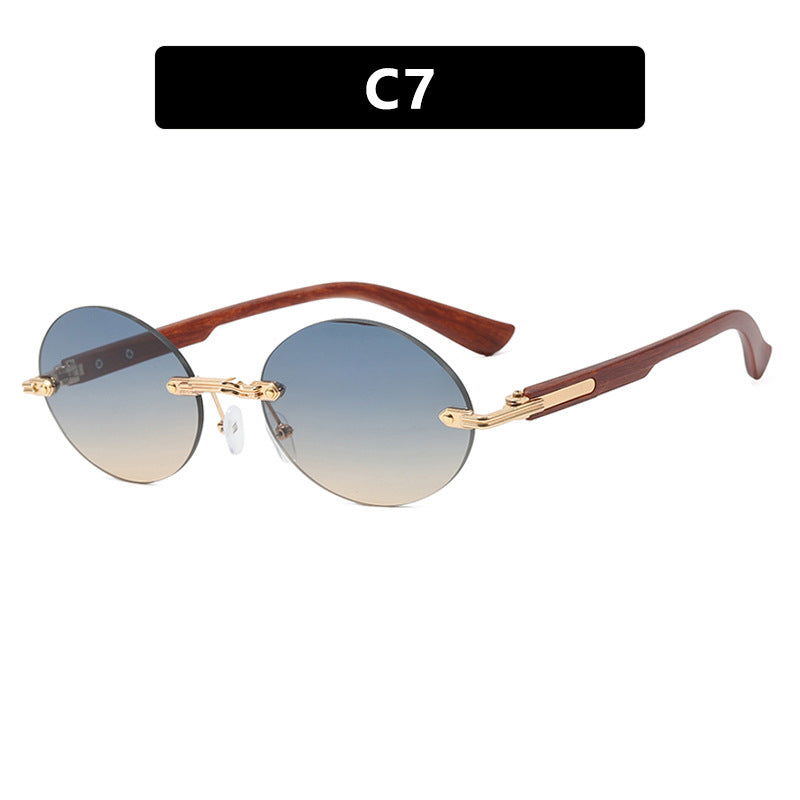 Dame rund solbrille med elegant treinnramme og UV-beskyttelse Luvikno