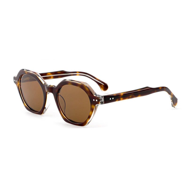 Dame solbrille i stilfull, sekskantet design med robust ramme og UV-beskyttelse Luvikno