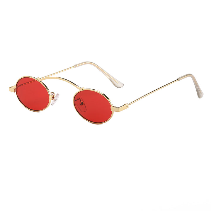 Dame moteriktig solbrille med unike sirkulære rammer og karakteristiske linser Luvikno
