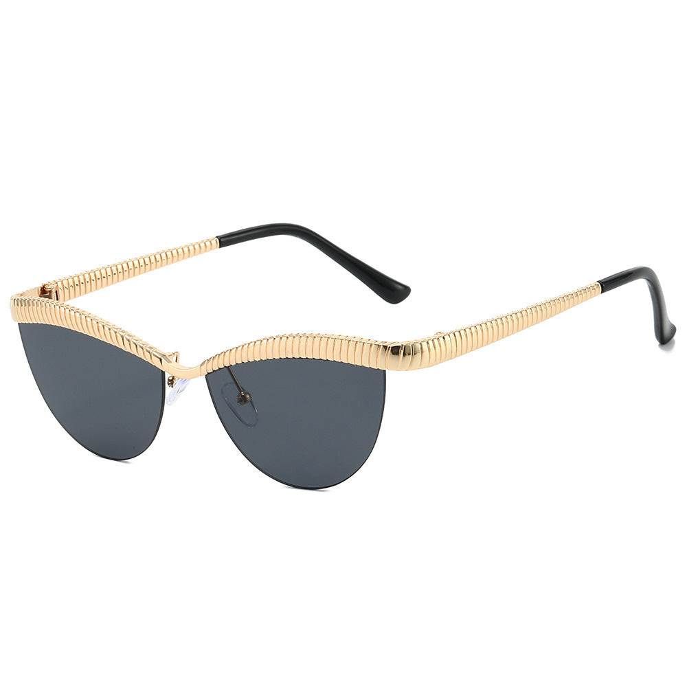 Dame Designer solbrille med unikt, bølget ramme Luvikno
