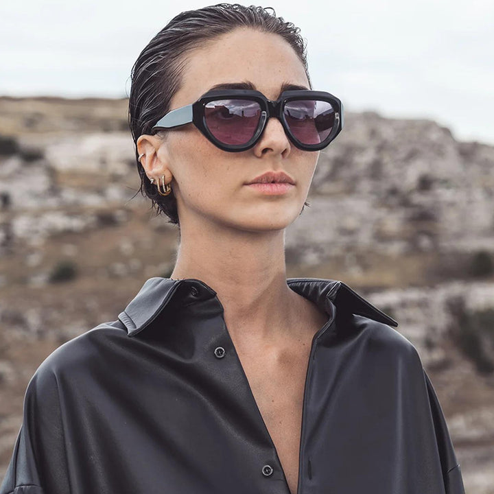 Dame cat-eye solbrille med moderne gjennomsiktig ramme og UV-beskyttelse Luvikno